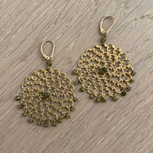 Gold and green sphere earrings by Wendy Mink.